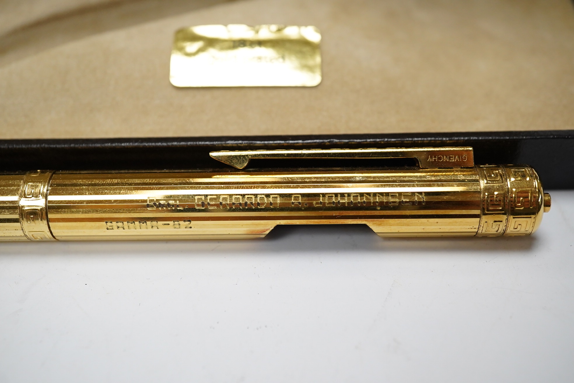 A Cartier gold plated pen and a Givenchy 18ct gold plated pen, both boxed. Cartier pen 13.5cm long. Condition - good, Givenchy box needs attention